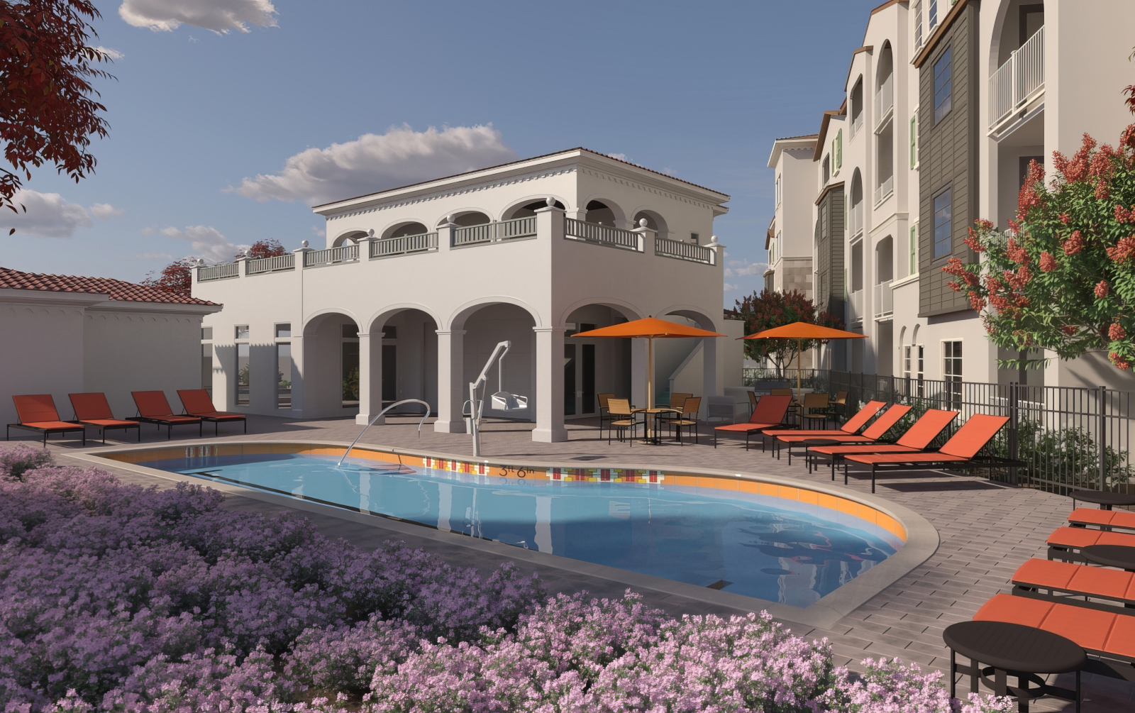 A pool surrounded by orange chairs and purple flowers.